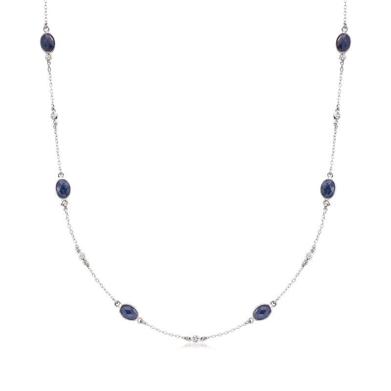 Sterling silver station necklace with oval blue sapphire stations and small diamond accents