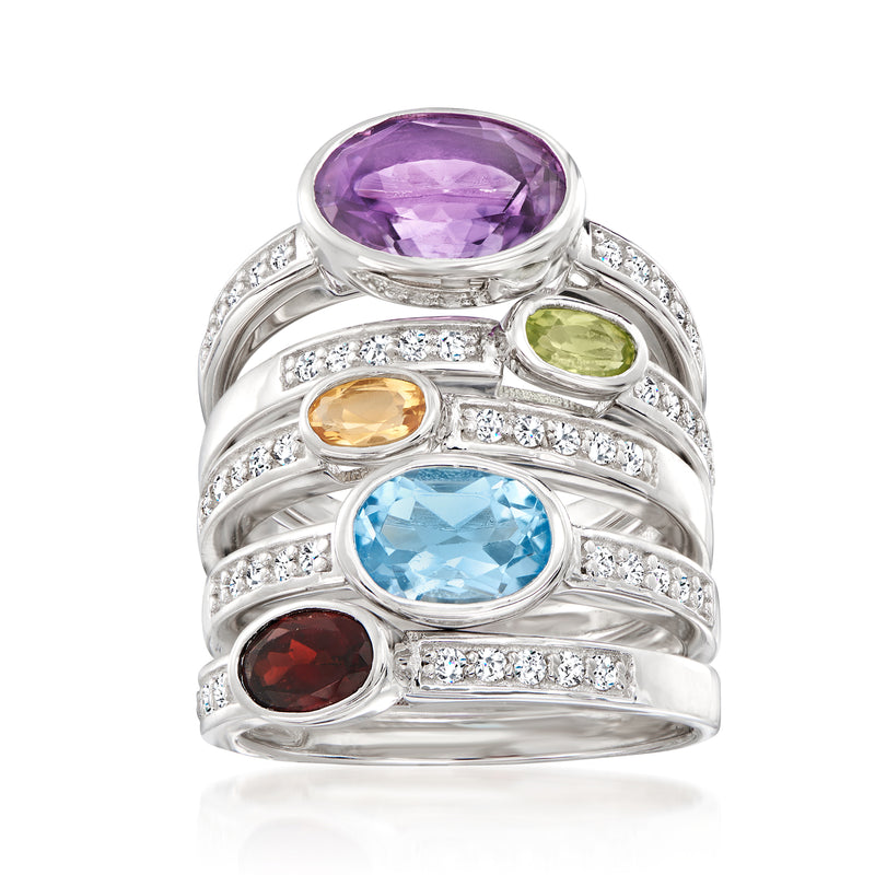Five-ring sterling silver set with oval gemstones: purple, green, orange, blue, red