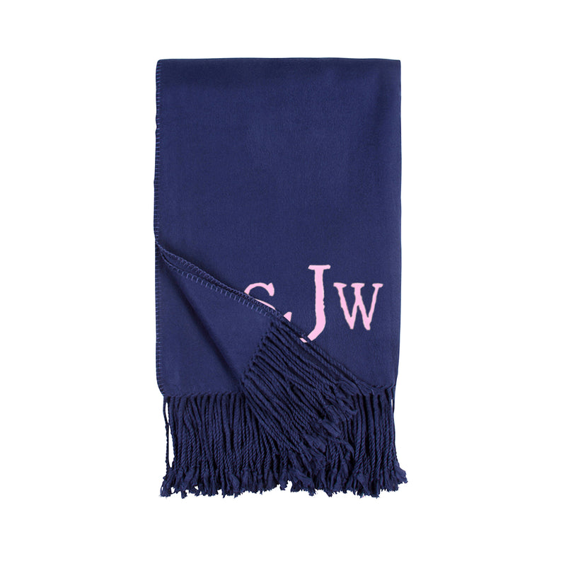 Indigo throw blanket with fringe edge and pink monogram initials
