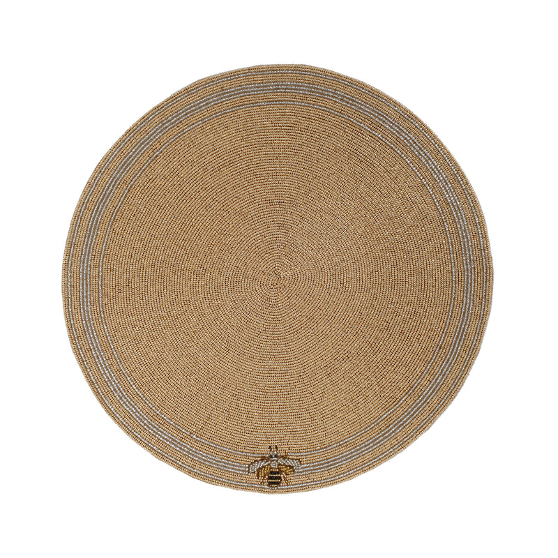 Round woven placemat in gold and beige stripes with small bee motif