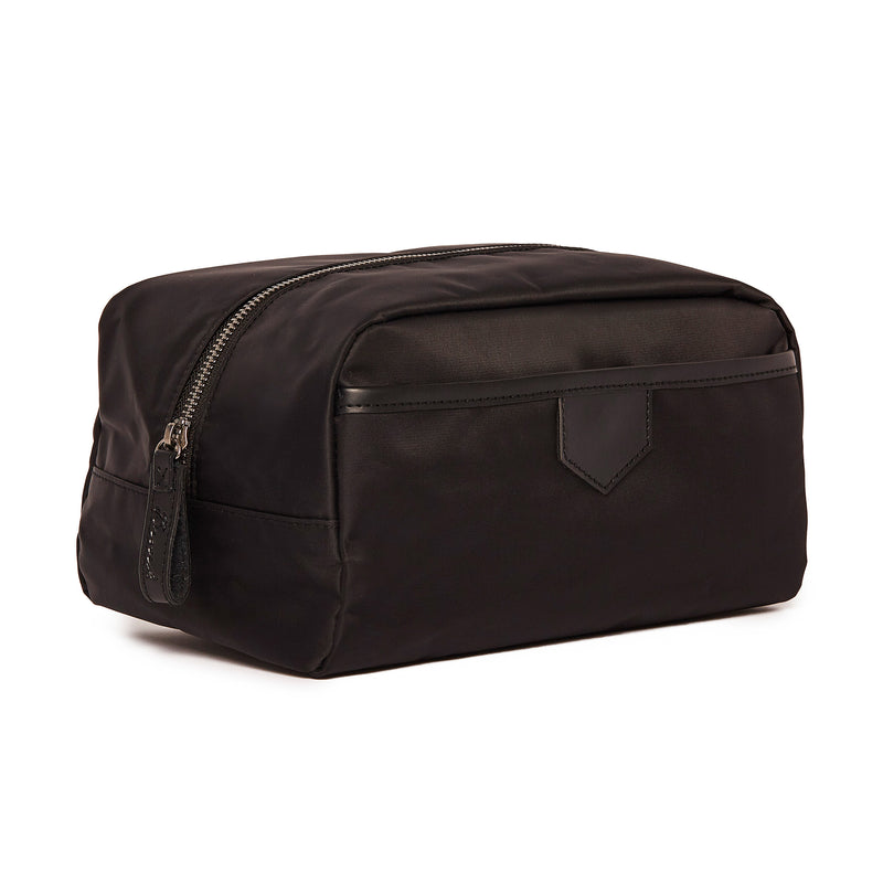 Brouk & Co. Omega black nylon toiletry bag with zip-top closure