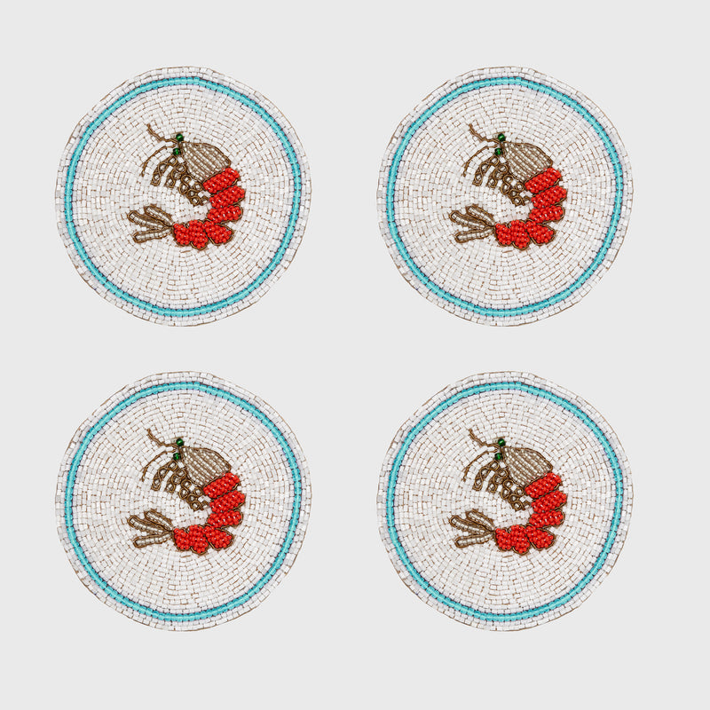 Set of 4 beaded-style shrimp coasters with turquoise blue outer rim