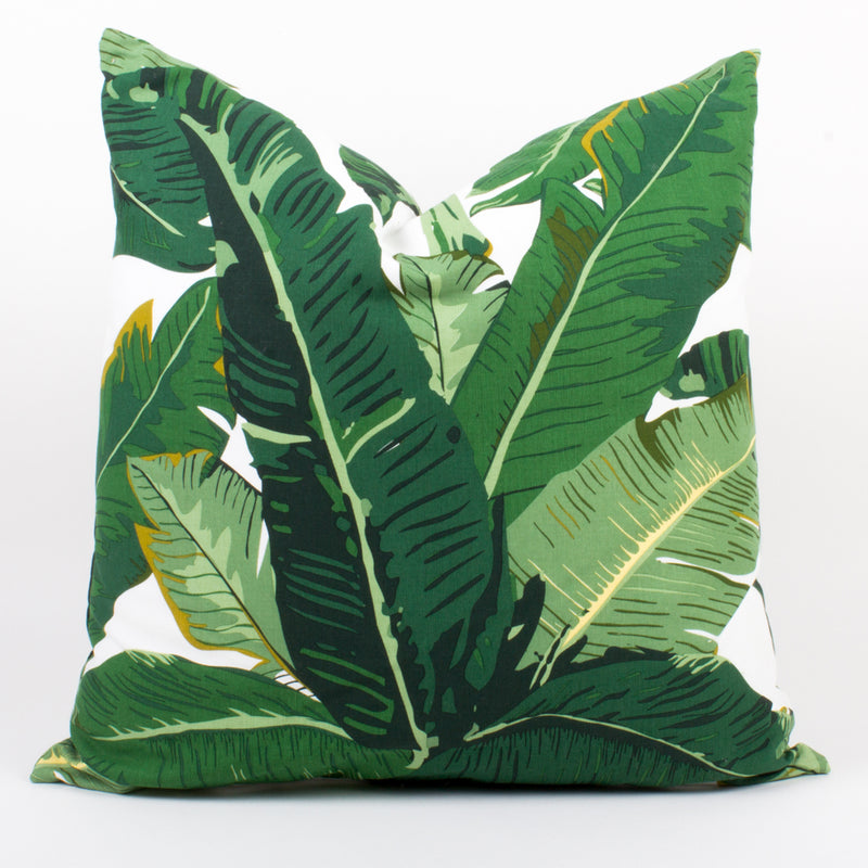 Set of 2 leaf print throw pillows with green and dark green foliage pattern