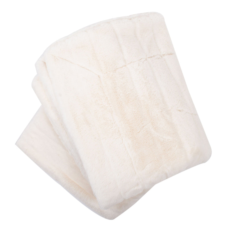White faux fur throw blanket, folded rectangular plush with soft pile texture
