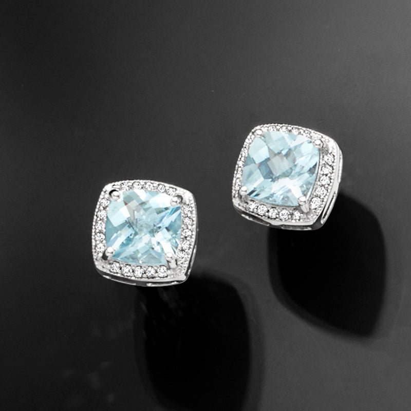 Aquamarine and diamond cushion halo stud earrings, angled pair, 14kt white gold