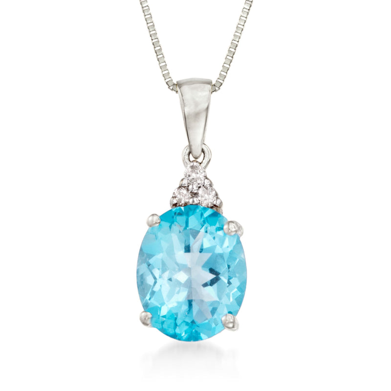 14kt white gold necklace with oval blue topaz and diamond accents, teardrop setting