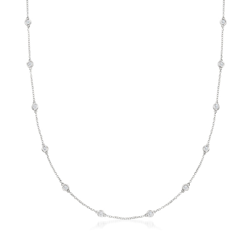 14kt white gold diamond station necklace with bezel-set round diamonds along chain