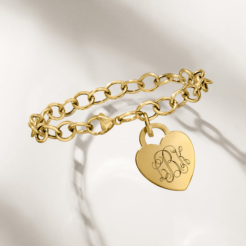 14kt yellow gold heart charm bracelet with lobster clasp and engraved heart pendant