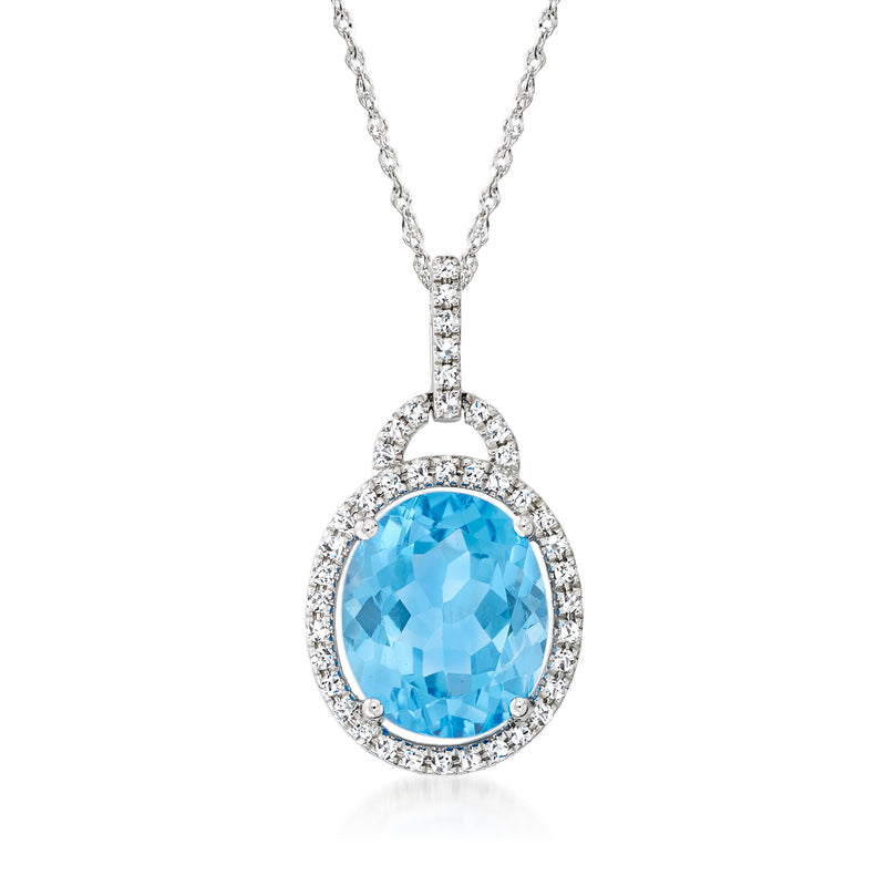 14kt white gold pendant necklace with oval sky blue topaz and diamond halo