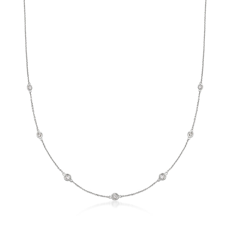 14kt white gold diamond station necklace with graduated bezel-set round stones