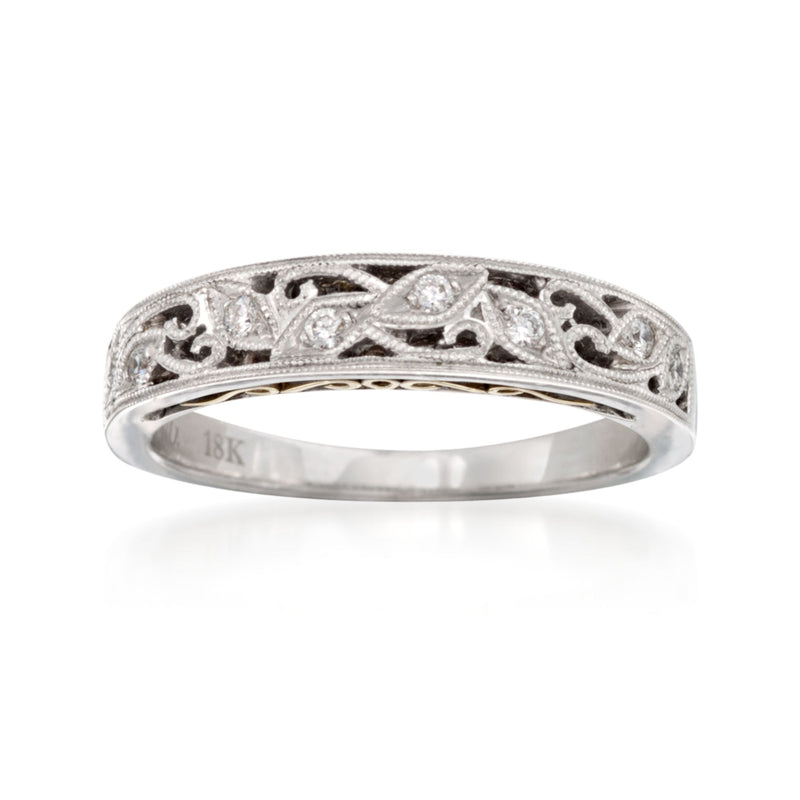 Two-tone gold wedding band with diamond accents, ornate filigree cutwork design