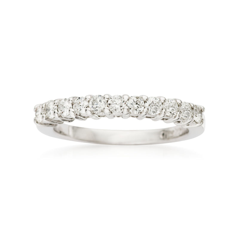 14kt white gold diamond wedding band with small round stones across the top