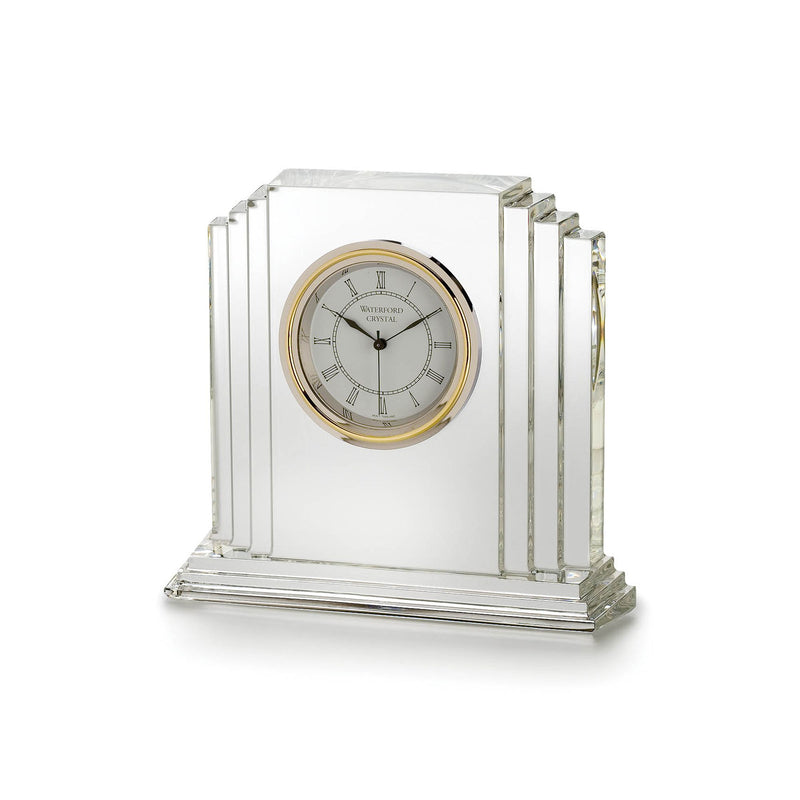 Crystal desk clock with round gold-tone dial and Roman numerals