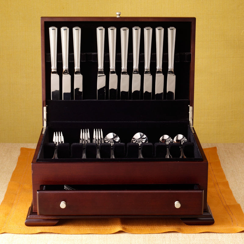 Walnut flatware chest open with drawers and compartments for silverware