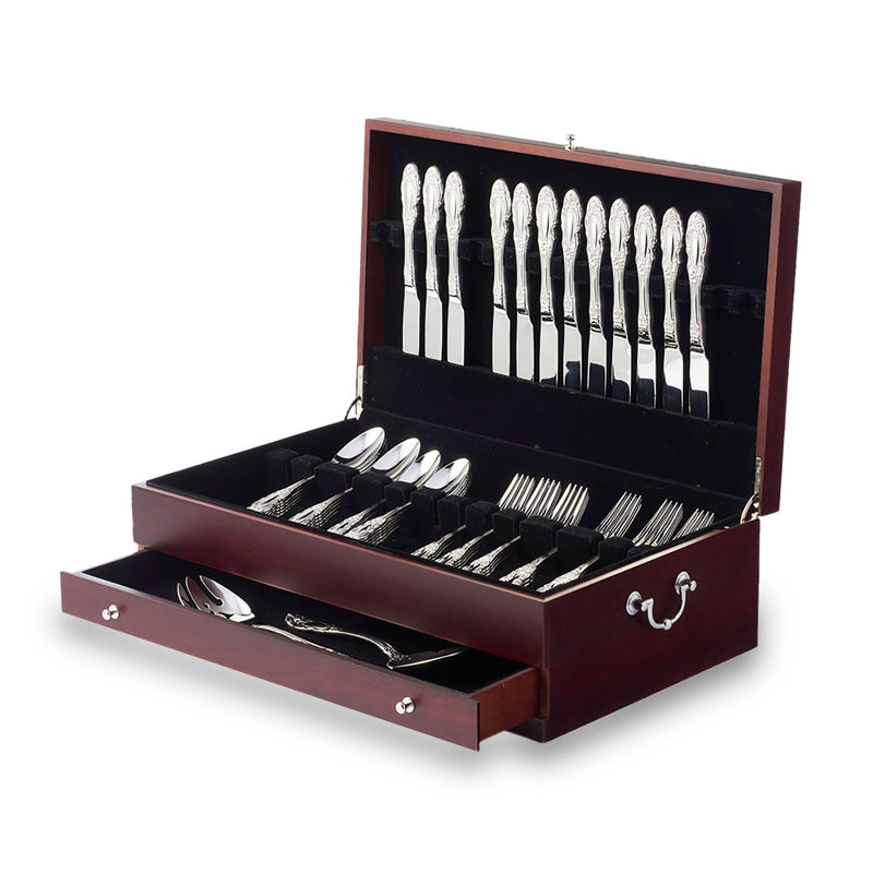 Dark walnut flatware chest with drawer, open lid showing stainless utensil set.