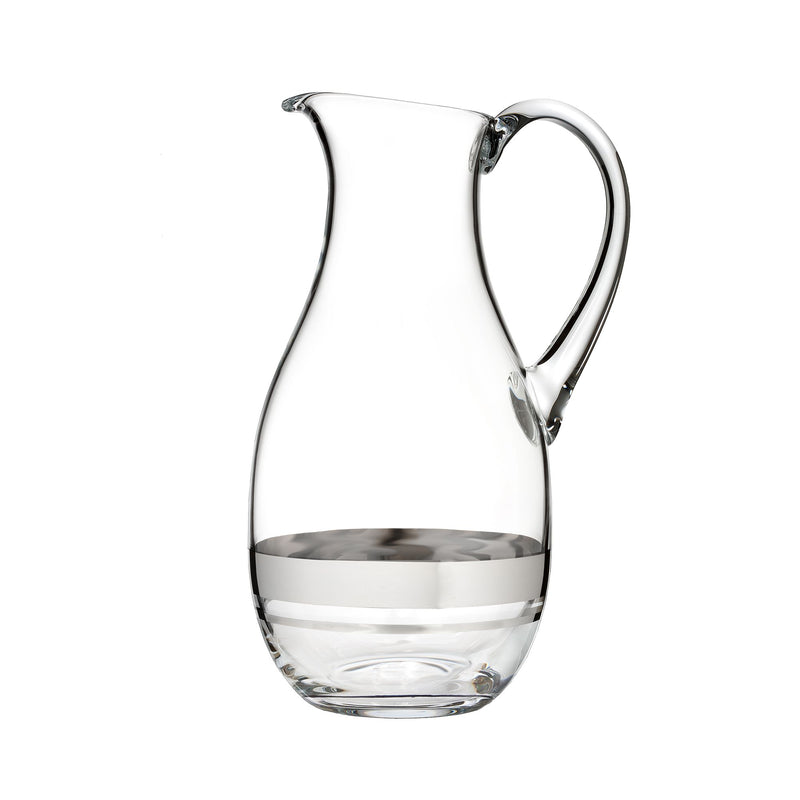 Waterford Elegance crystal pitcher with curved handle and faceted base