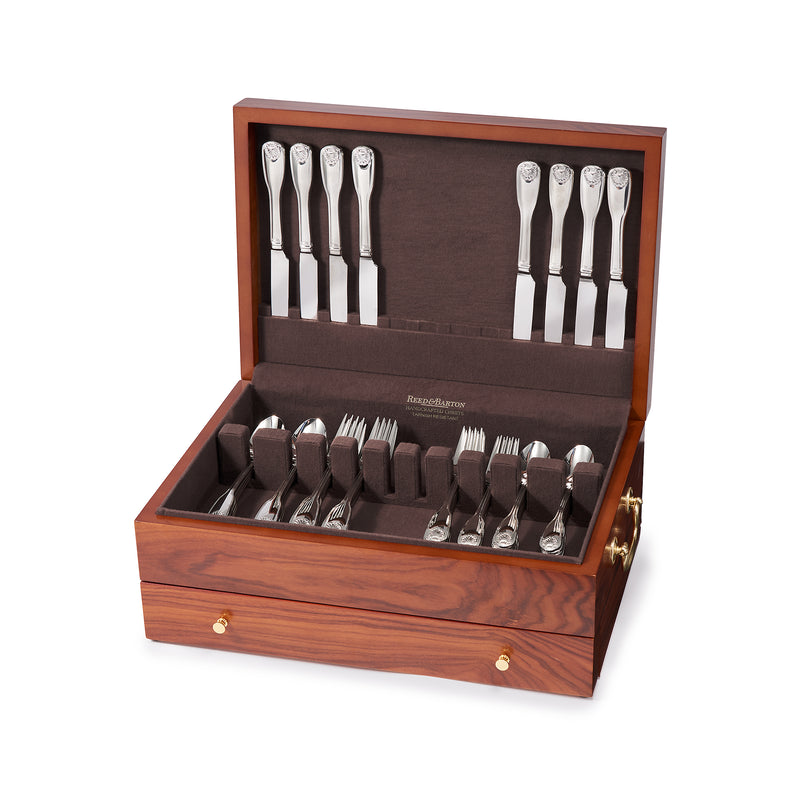Reed & Barton rosewood-finished wooden flatware chest, open with silver utensils and drawer