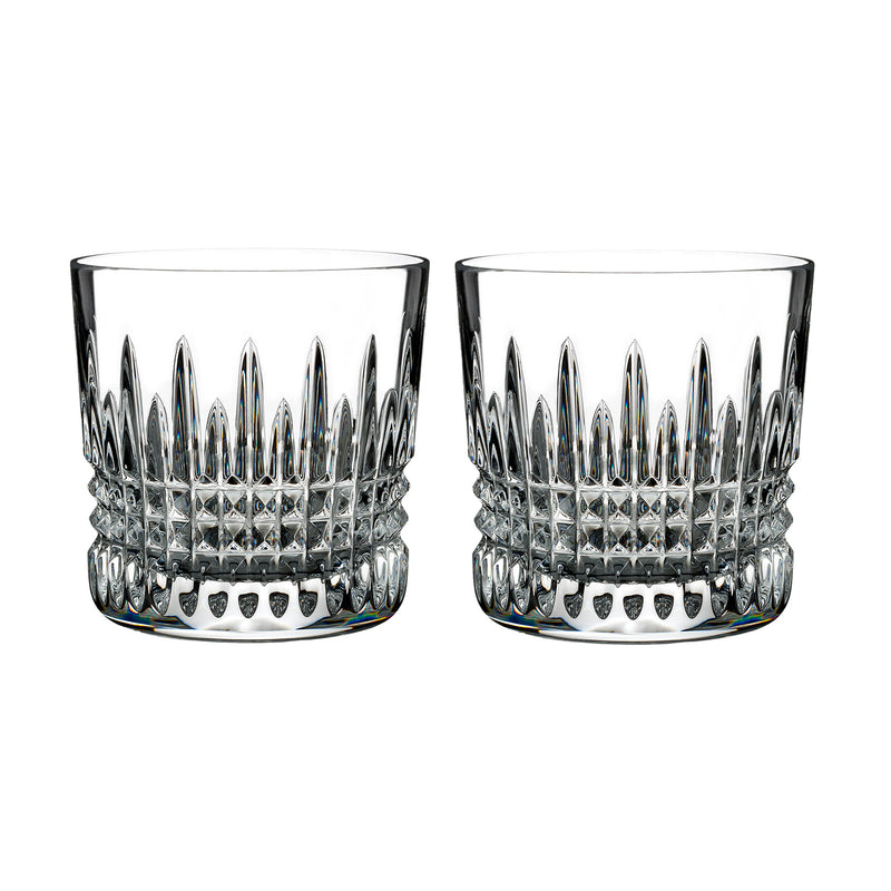 Pair of clear crystal diamond-cut tumblers with faceted band and scalloped base