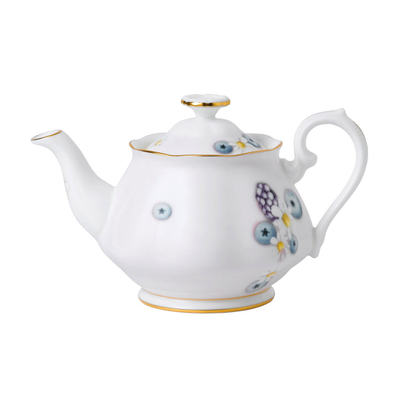 Mini teapot with pink-toned floral side pattern, gold rim, and curved spout