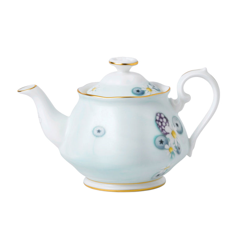 Turquoise mini teapot with floral and star pattern, gold rim and handle