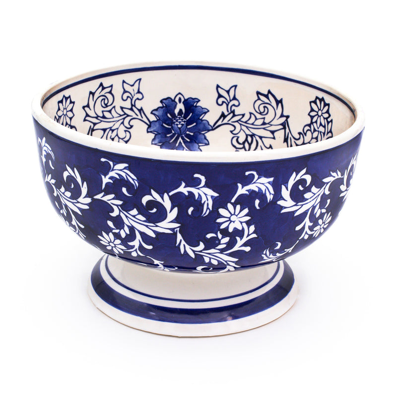 Blue porcelain floral bowl with handpainted pattern and pedestal base, wide rim