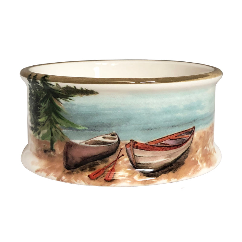 Round ceramic wine coaster with lake landscape, boats, and pine trees