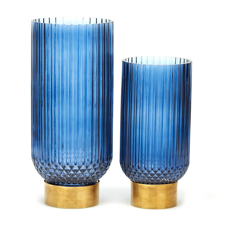 Set of 2 blue ribbed glass candleholders with brass bases, cylindrical vases