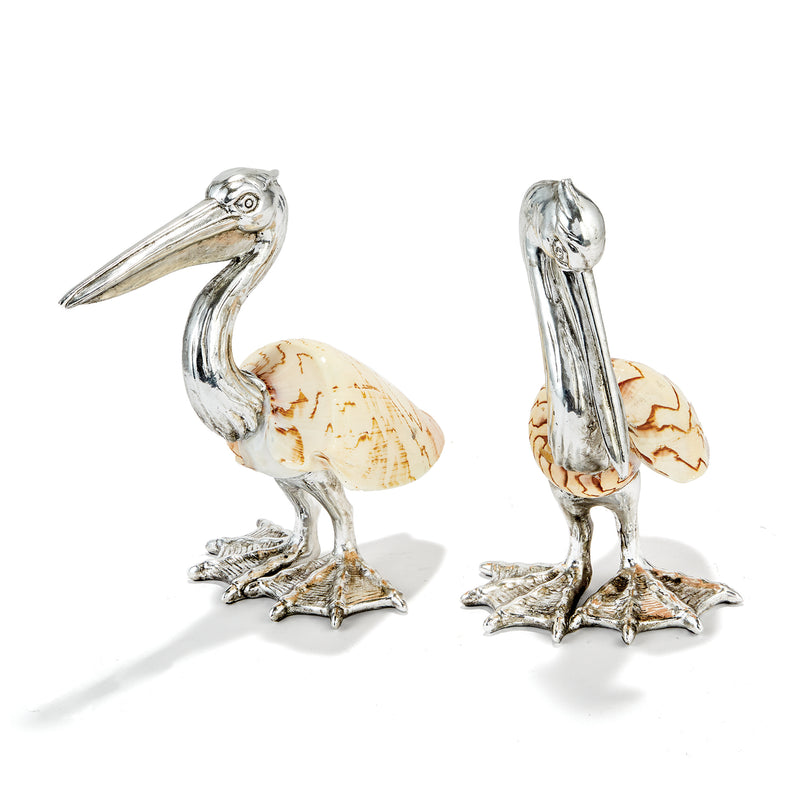 Set of 2 silver pelican shell sculptures with beige shell accents, standing