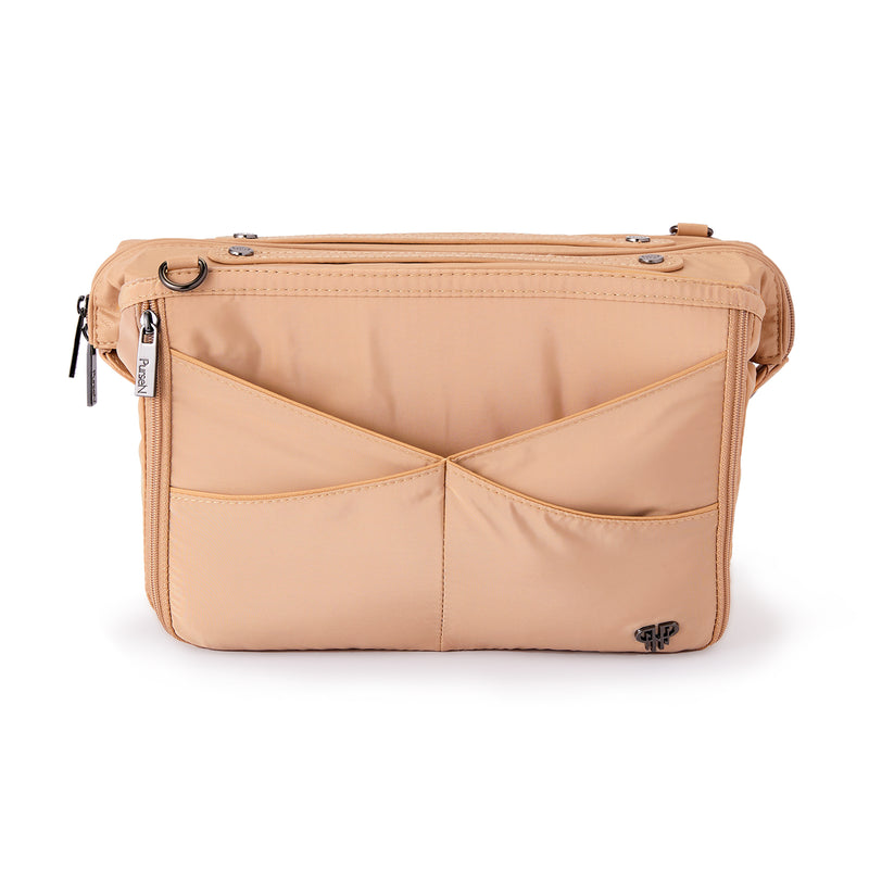 Nude nylon purse organizer with structured front compartments and top zip closure