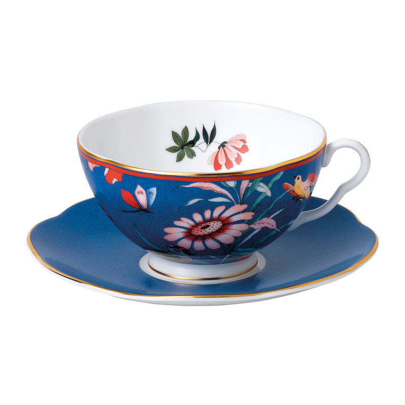 Wedgwood blue floral teacup and saucer set with blush pink flowers and gold trim