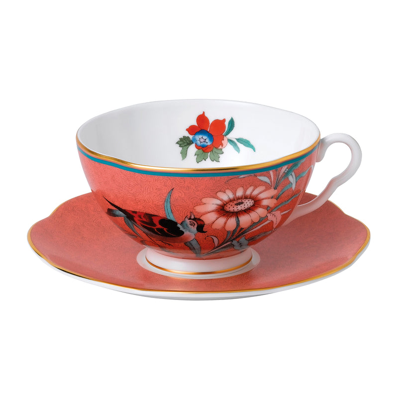 Wedgwood coral teacup and saucer set with floral bouquet and gold rim