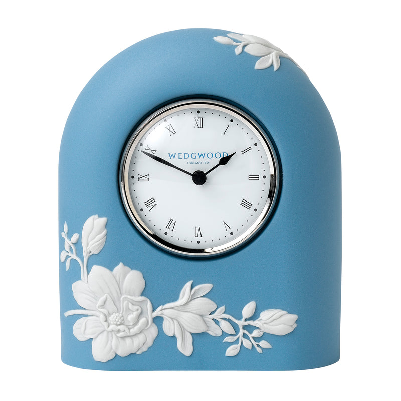 Wedgwood blue mantel clock with white floral relief, Roman numeral dial and black hands