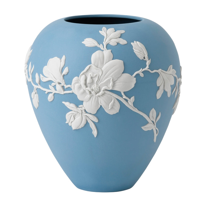 Wedgwood blue ceramic vase with white Magnolia blossom relief flowers