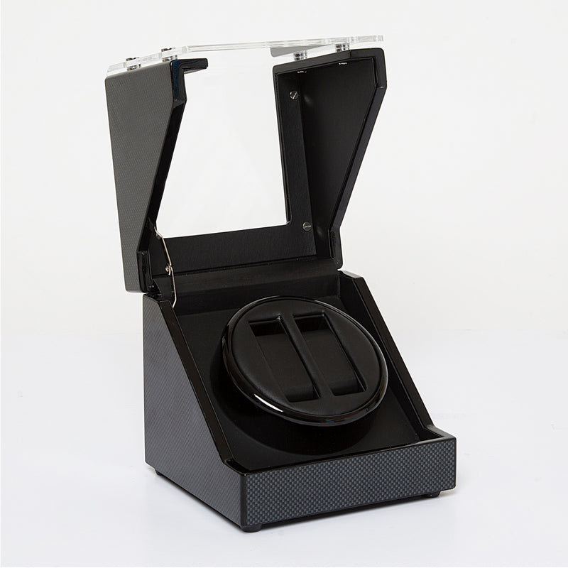 Carbon fiber watch winder open, showing black coil holder and interior base
