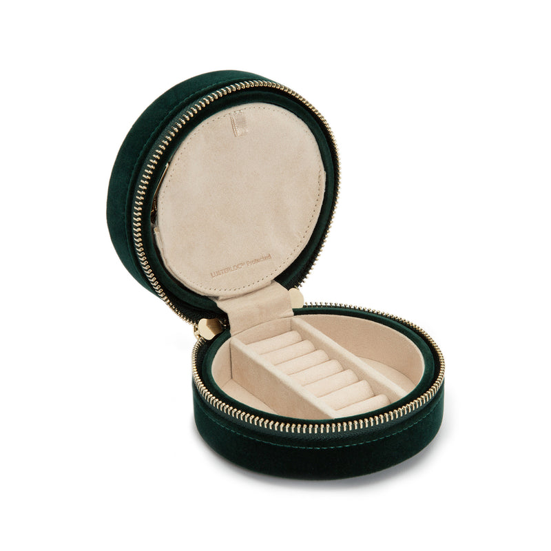 Round forest green velvet jewelry travel case with zip, beige lining, ring holder slots