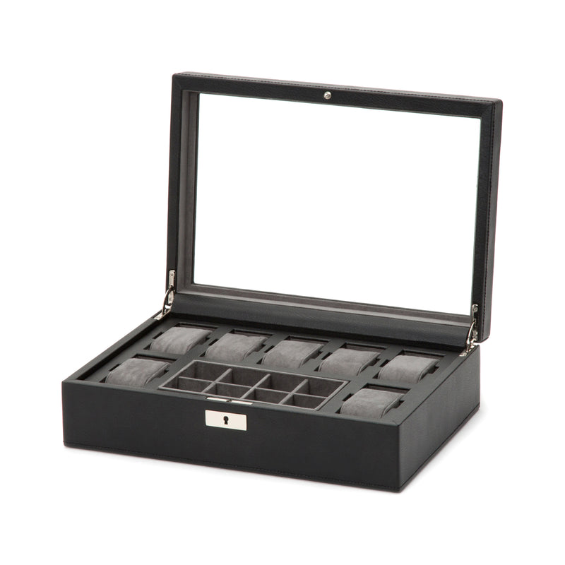 Black leather watch box with hinged lid, open compartments and gray watch pillows