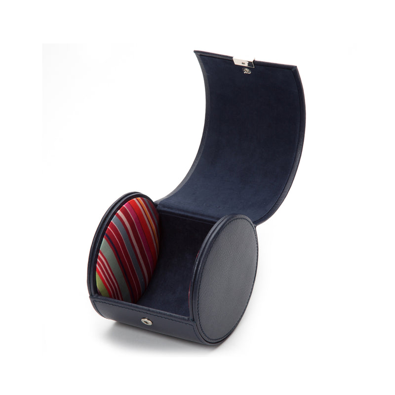 Navy leather tie roll with red, green striped necktie inside