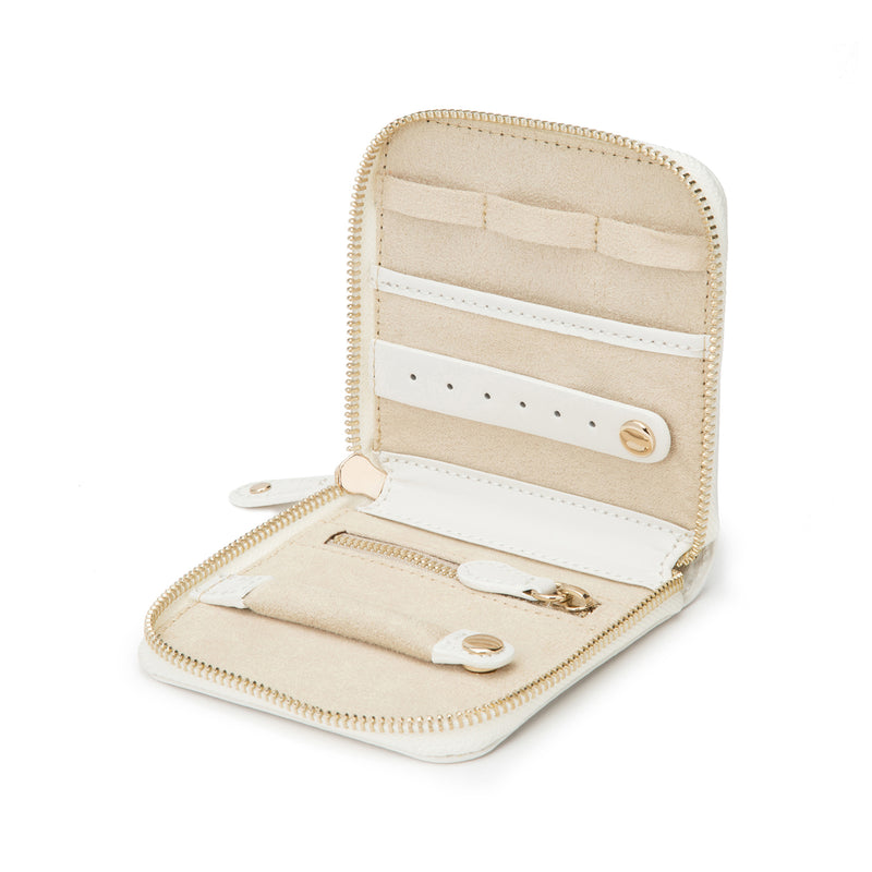Cream leather travel case, zip-top, open with card slots and buttoned compartments