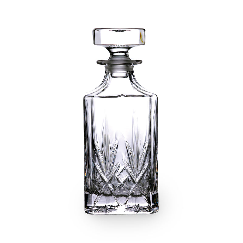 Clear cut-crystal decanter with faceted base and matching stopper