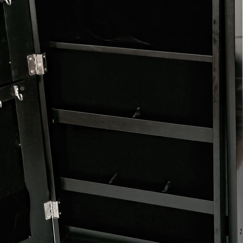 Black jewelry armoire interior shelf with divider bars and hinge hardware, open