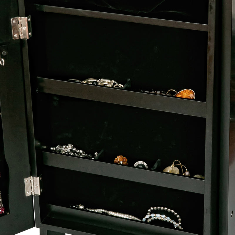 Black jewelry armoire open, lower shelves with rings, bracelets, and necklace displays