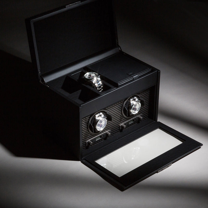 Open two-module watch winder showing two watch holders and a white padded top tray