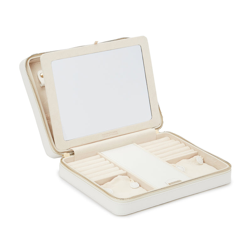 White leather large jewelry zip case open with organizer pads and compartments