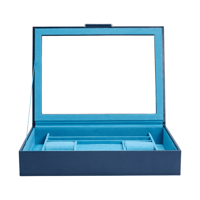 Indigo leather jewelry box open with hinged lid and blue base organizers