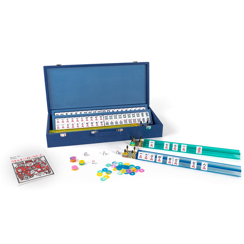 Blue faux leather mahjong set with open case, tiles, racks, and colorful counters