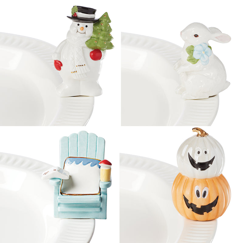 Porcelain holiday poppers set of four with snowman, bunny, gift, and jack-o-lantern