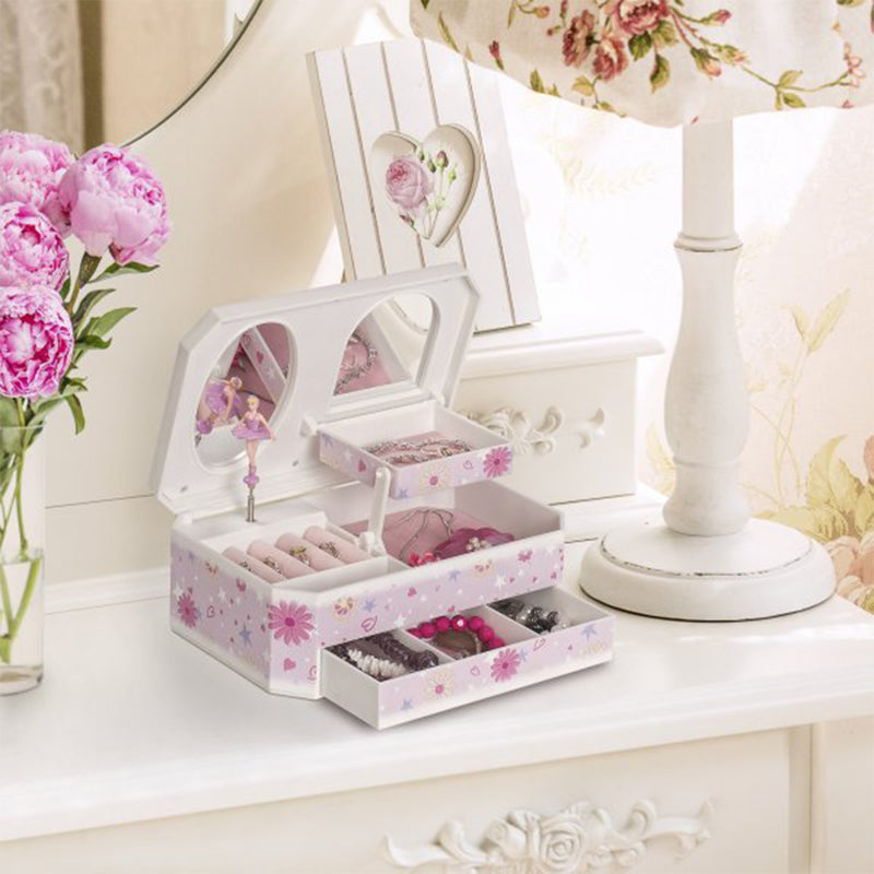 Musical ballerina jewelry box on display, open compartments with pink figurine