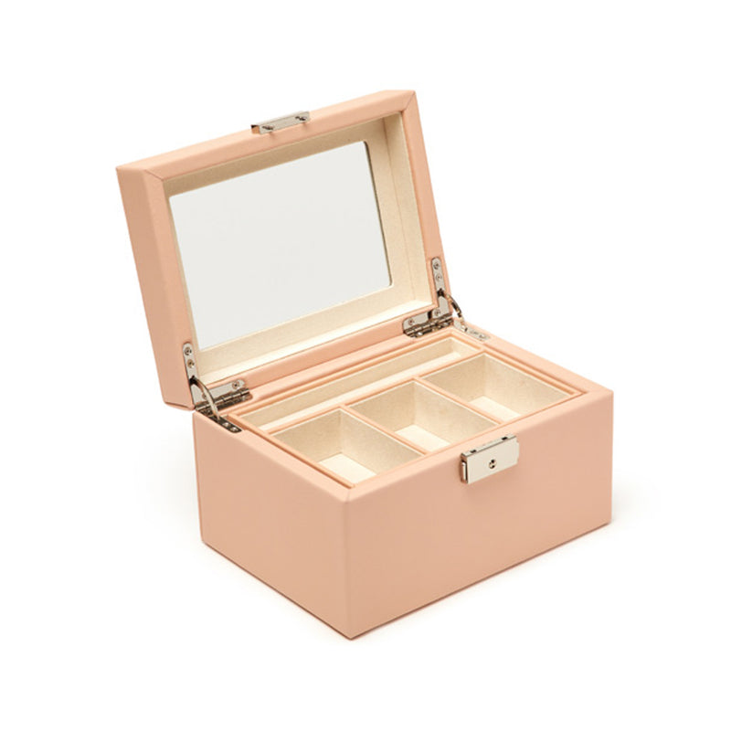 Pink faux leather jewelry box with hinged lid and interior compartments