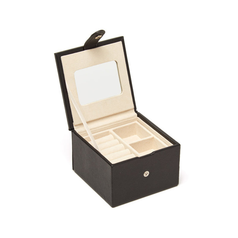 Brouk & Co. black faux leather two-tray jewelry box, open with beige compartments