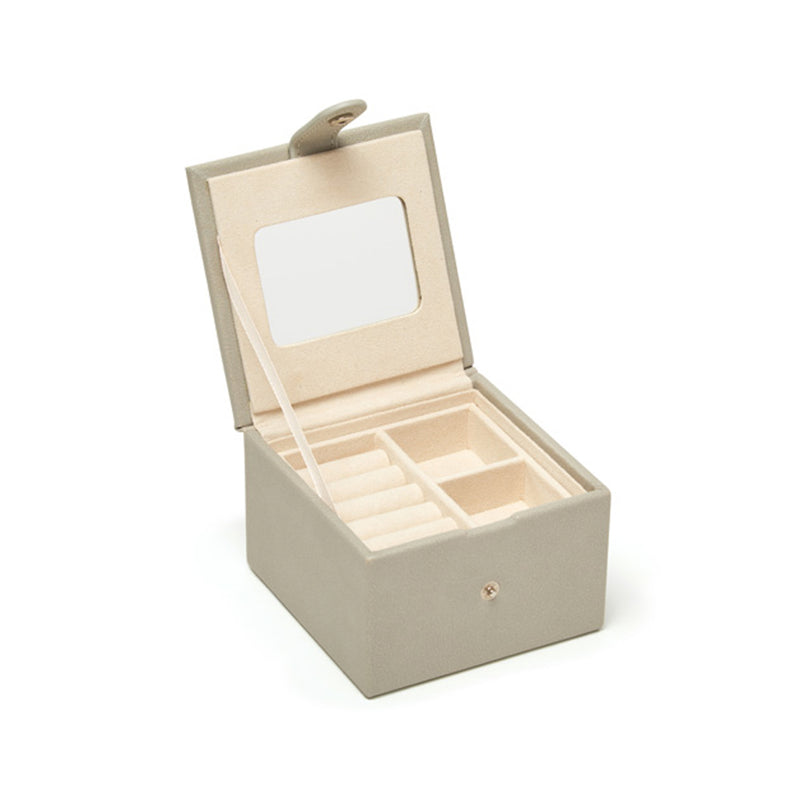 Gray faux leather jewelry box open with two divided trays for rings and small items